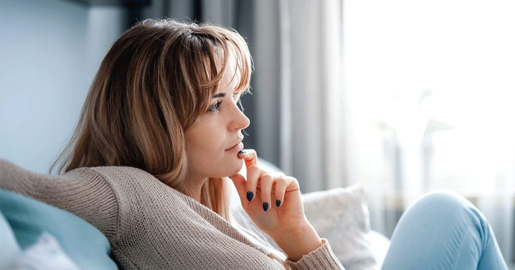 A woman thinking about her pregnancy options if she doesn't have any money